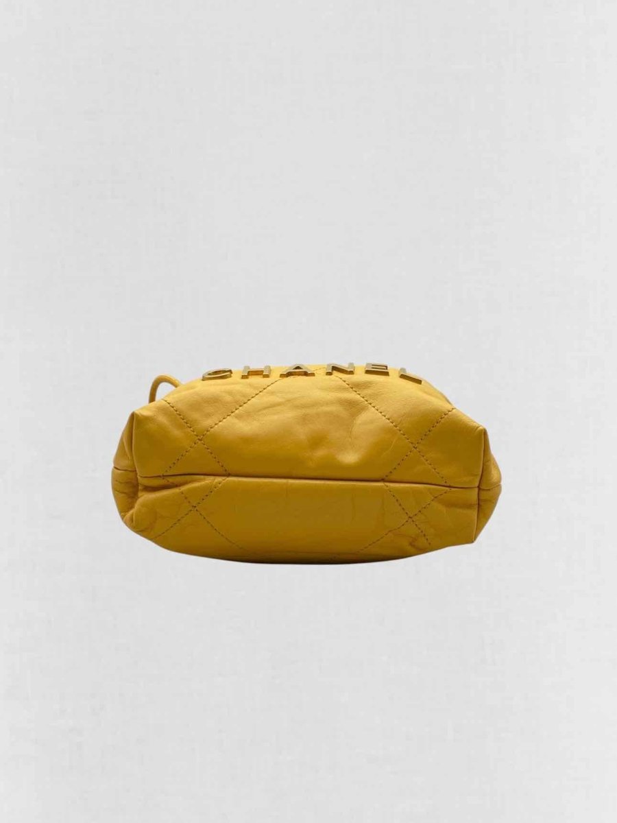 Pre - loved CHANEL 22 Mustard Quilted Crossbody at Reems Closet
