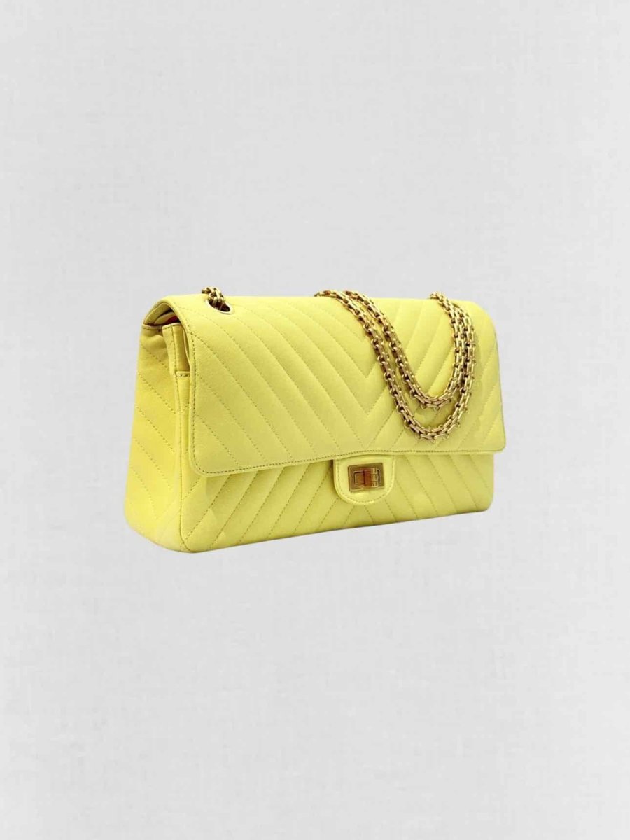 Pre - loved CHANEL 2.55 Reissue Yellow Chevron Shoulder Bag at Reems Closet