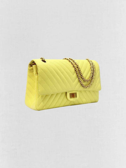 Pre - loved CHANEL 2.55 Reissue Yellow Chevron Shoulder Bag at Reems Closet