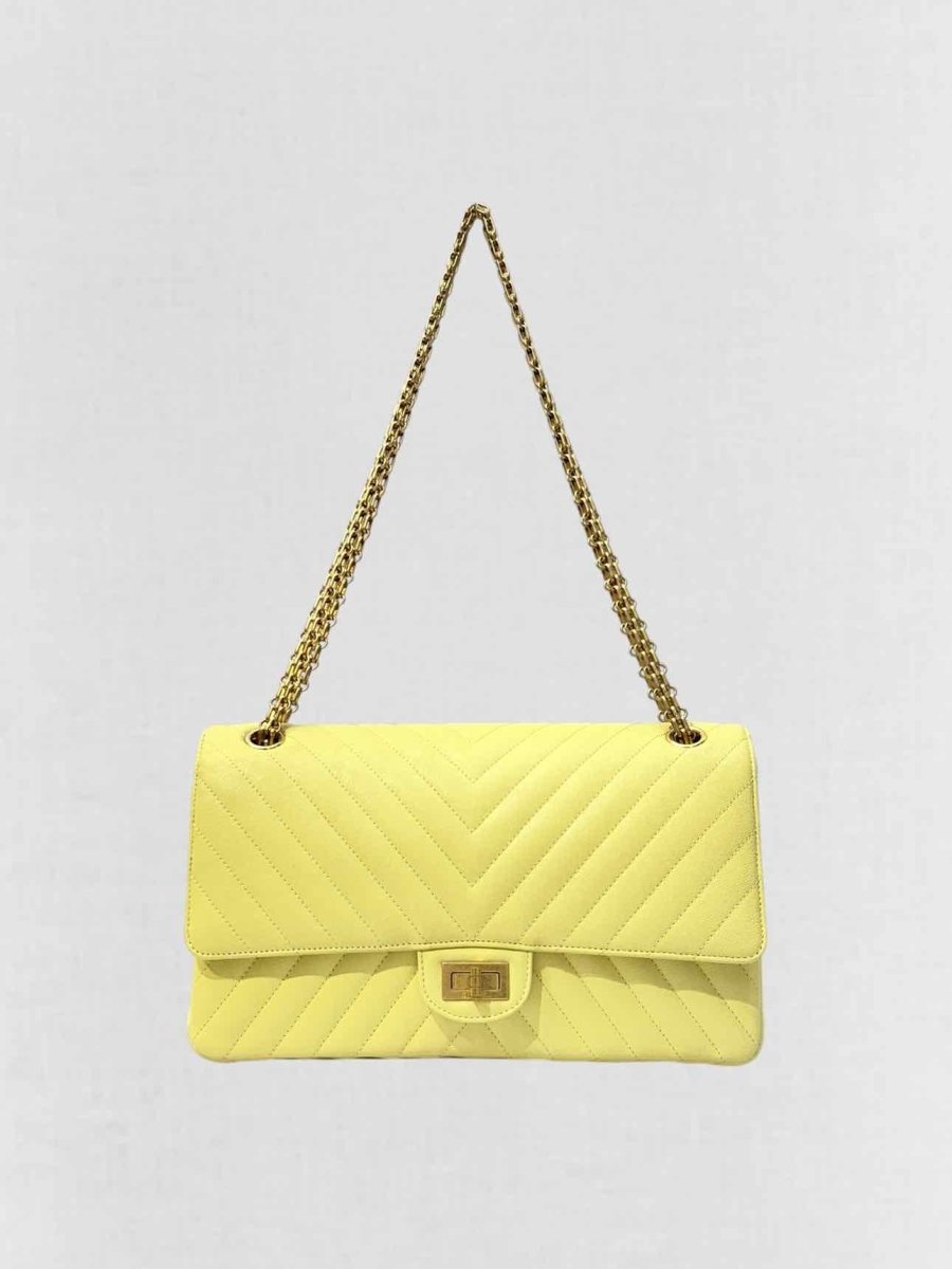 Pre - loved CHANEL 2.55 Reissue Yellow Chevron Shoulder Bag at Reems Closet