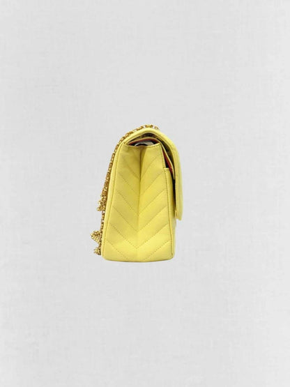 Pre - loved CHANEL 2.55 Reissue Yellow Chevron Shoulder Bag at Reems Closet