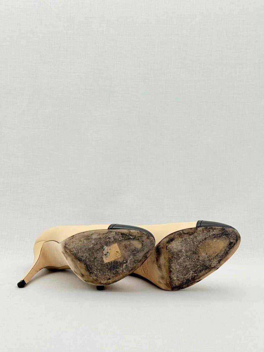 Pre - loved CHANEL Beige w/ Black CC Cap Toe Size EU 38 Pumps at Reems Closet