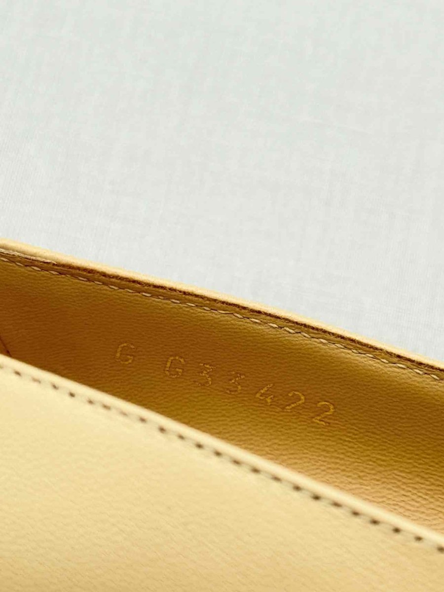 Pre - loved CHANEL Beige w/ Black CC Cap Toe Size EU 38 Pumps at Reems Closet