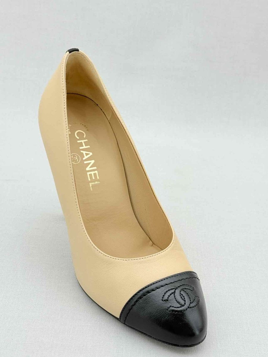 Pre - loved CHANEL Beige w/ Black CC Cap Toe Size EU 38 Pumps at Reems Closet