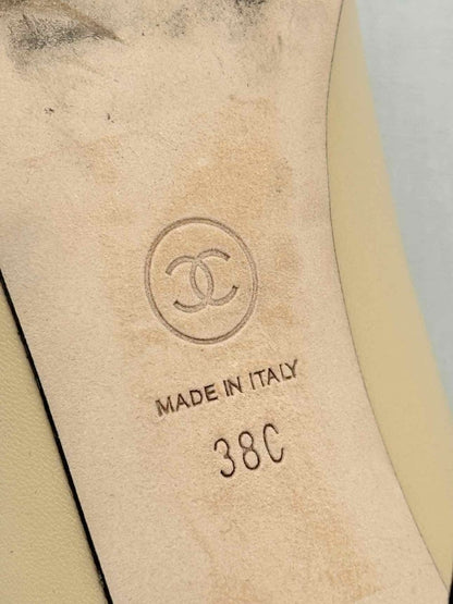 Pre - loved CHANEL Beige w/ Black CC Cap Toe Size EU 38 Pumps at Reems Closet