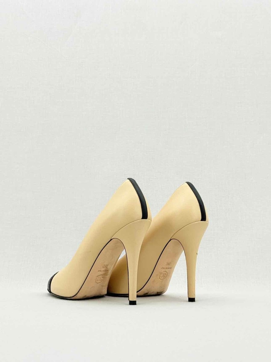 Pre - loved CHANEL Beige w/ Black CC Cap Toe Size EU 38 Pumps at Reems Closet