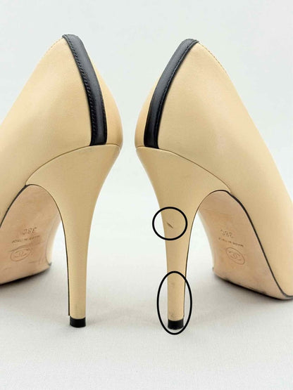 Pre - loved CHANEL Beige w/ Black CC Cap Toe Size EU 38 Pumps at Reems Closet