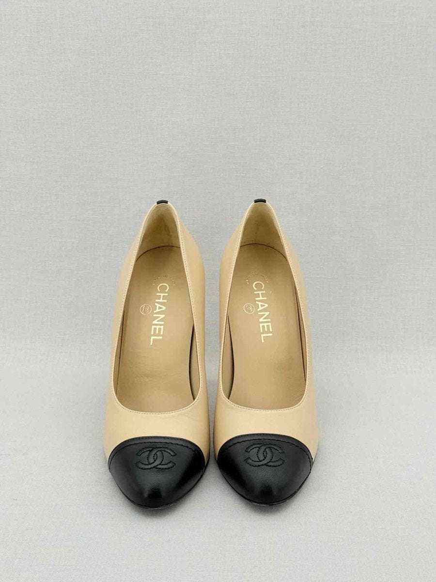 Pre - loved CHANEL Beige w/ Black CC Cap Toe Size EU 38 Pumps at Reems Closet