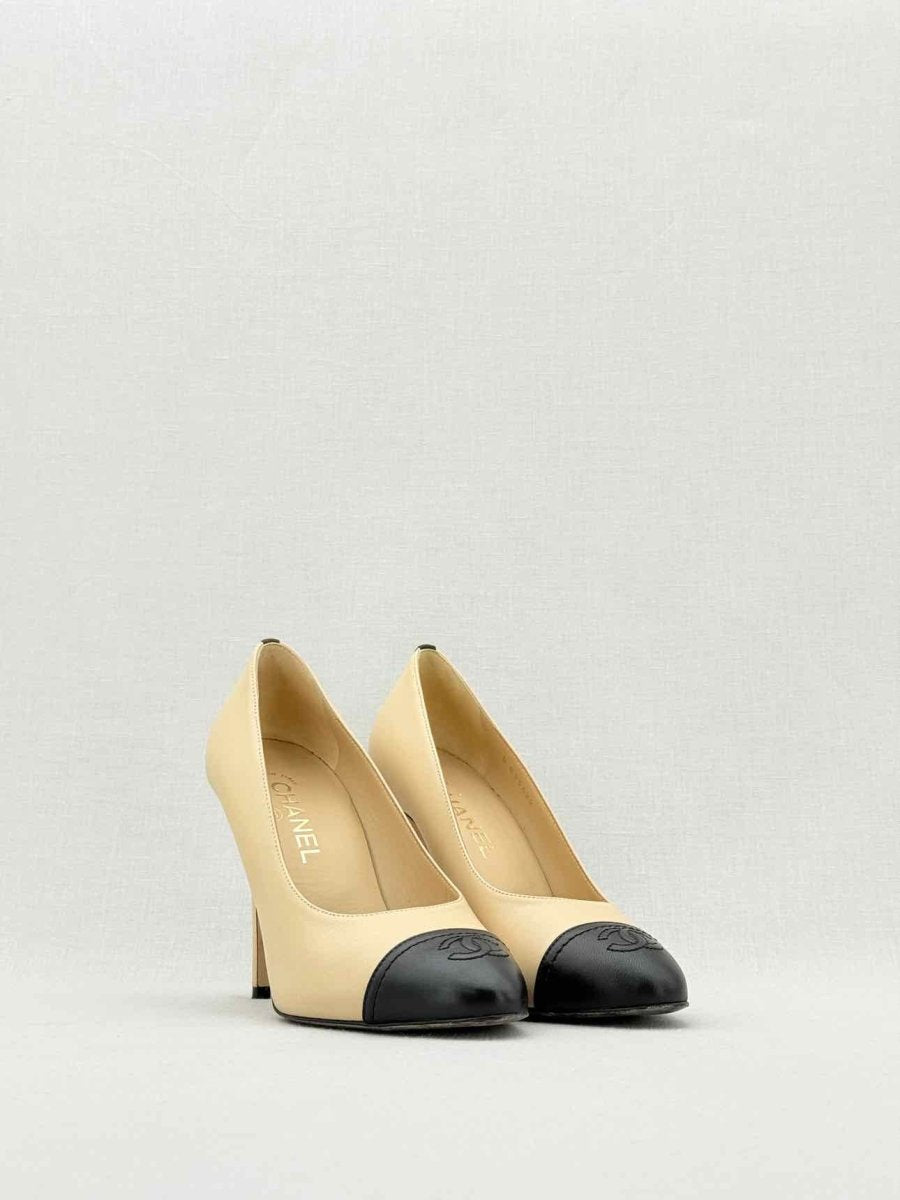 Pre - loved CHANEL Beige w/ Black CC Cap Toe Size EU 38 Pumps at Reems Closet