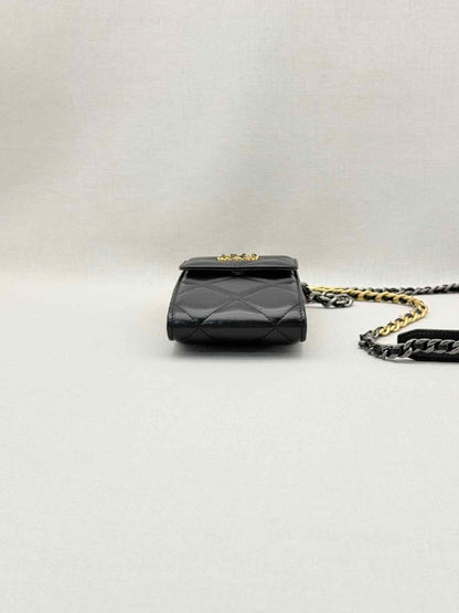 Pre-loved CHANEL Black Quilted Phone case at Reems Closet
