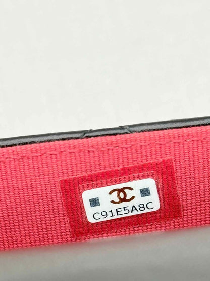 Pre-loved CHANEL Black Quilted Phone case at Reems Closet