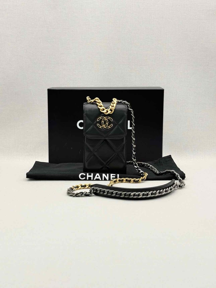 Pre-loved CHANEL Black Quilted Phone case at Reems Closet