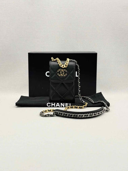 Pre-loved CHANEL Black Quilted Phone case at Reems Closet
