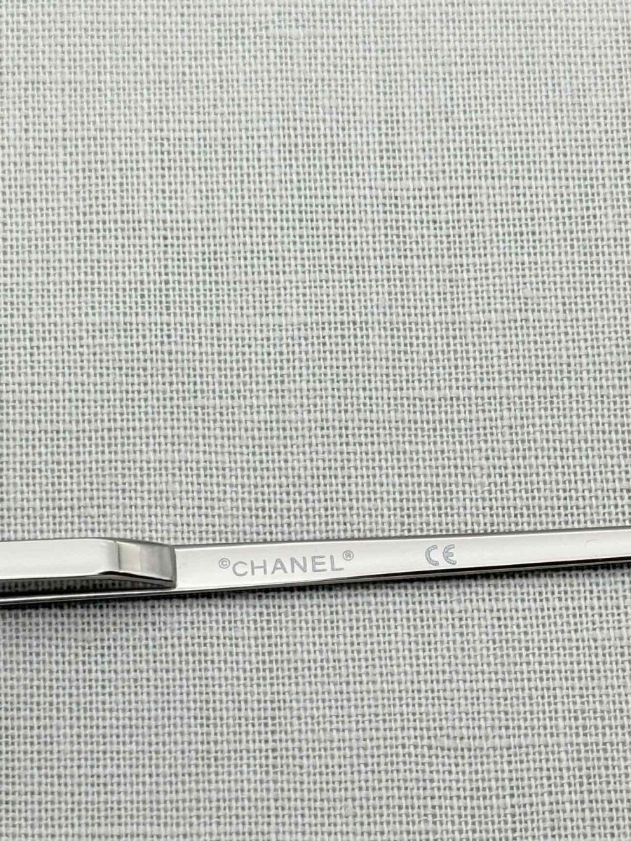 Pre - loved CHANEL Black Sunglasses at Reems Closet