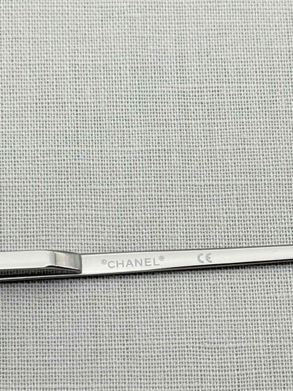 Pre - loved CHANEL Black Sunglasses at Reems Closet