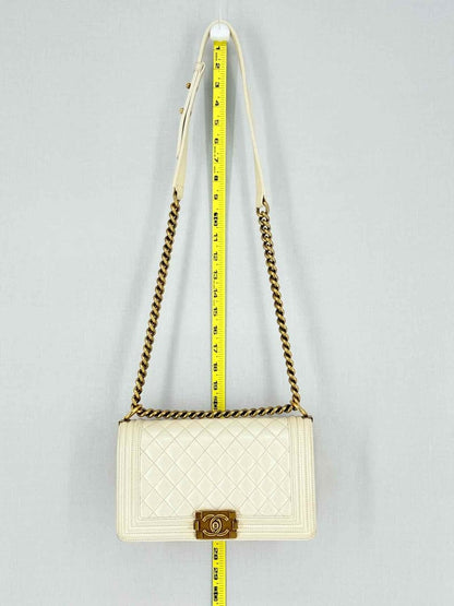 Pre - loved CHANEL Boy Beige Quilted Shoulder Bag at Reems Closet