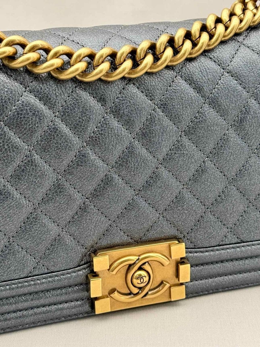 Pre - loved CHANEL Boy Metallic Blue Quilted Shoulder Bag at Reems Closet