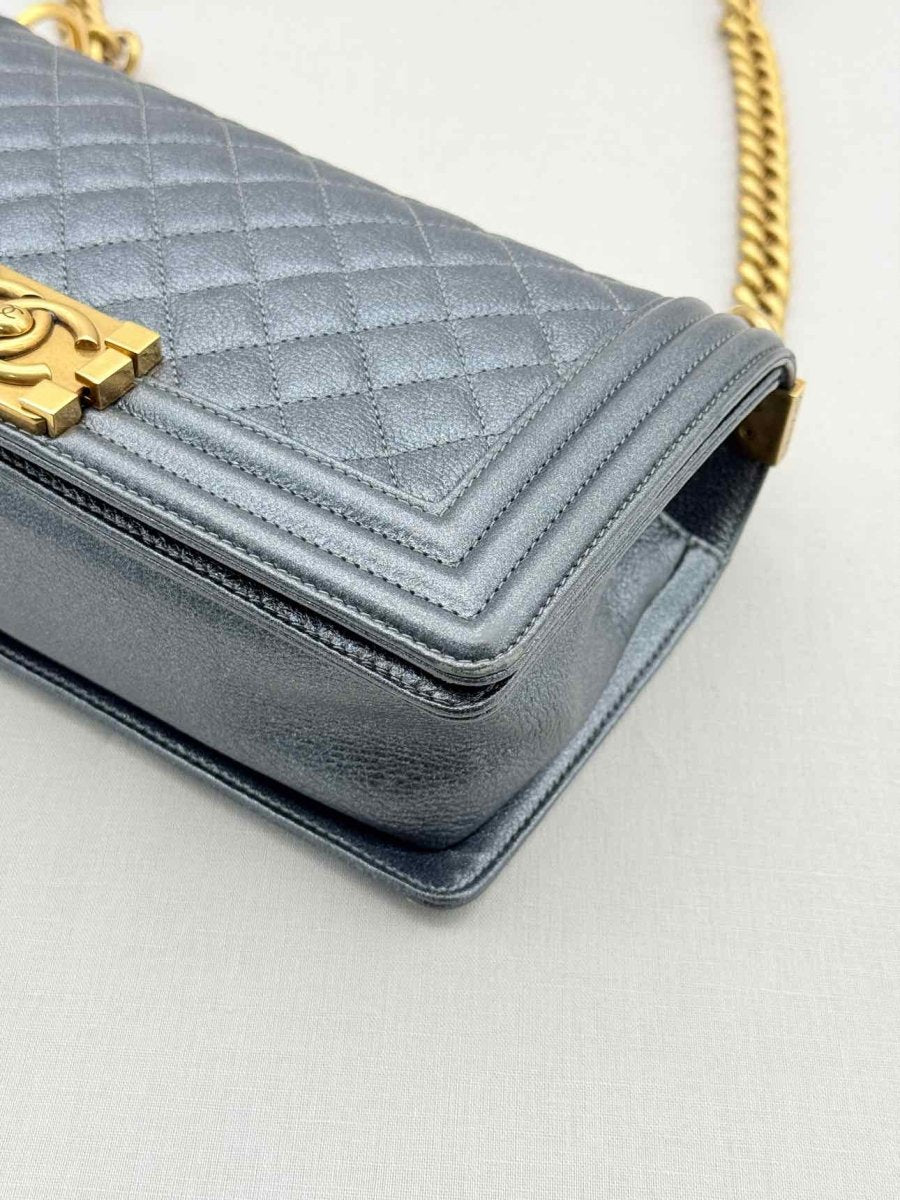 Pre - loved CHANEL Boy Metallic Blue Quilted Shoulder Bag at Reems Closet