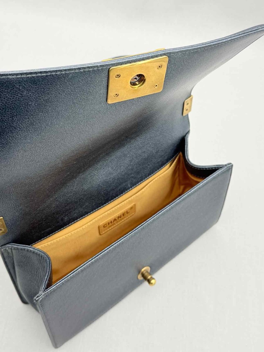 Pre - loved CHANEL Boy Metallic Blue Quilted Shoulder Bag at Reems Closet