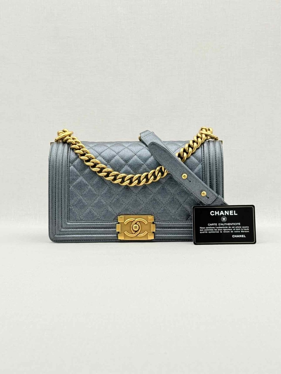 Pre - loved CHANEL Boy Metallic Blue Quilted Shoulder Bag at Reems Closet