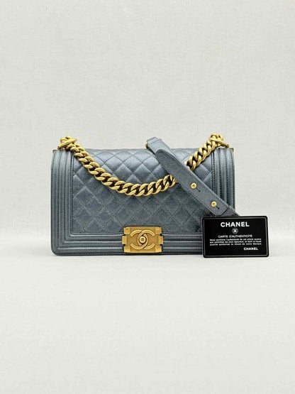 Pre - loved CHANEL Boy Metallic Blue Quilted Shoulder Bag at Reems Closet