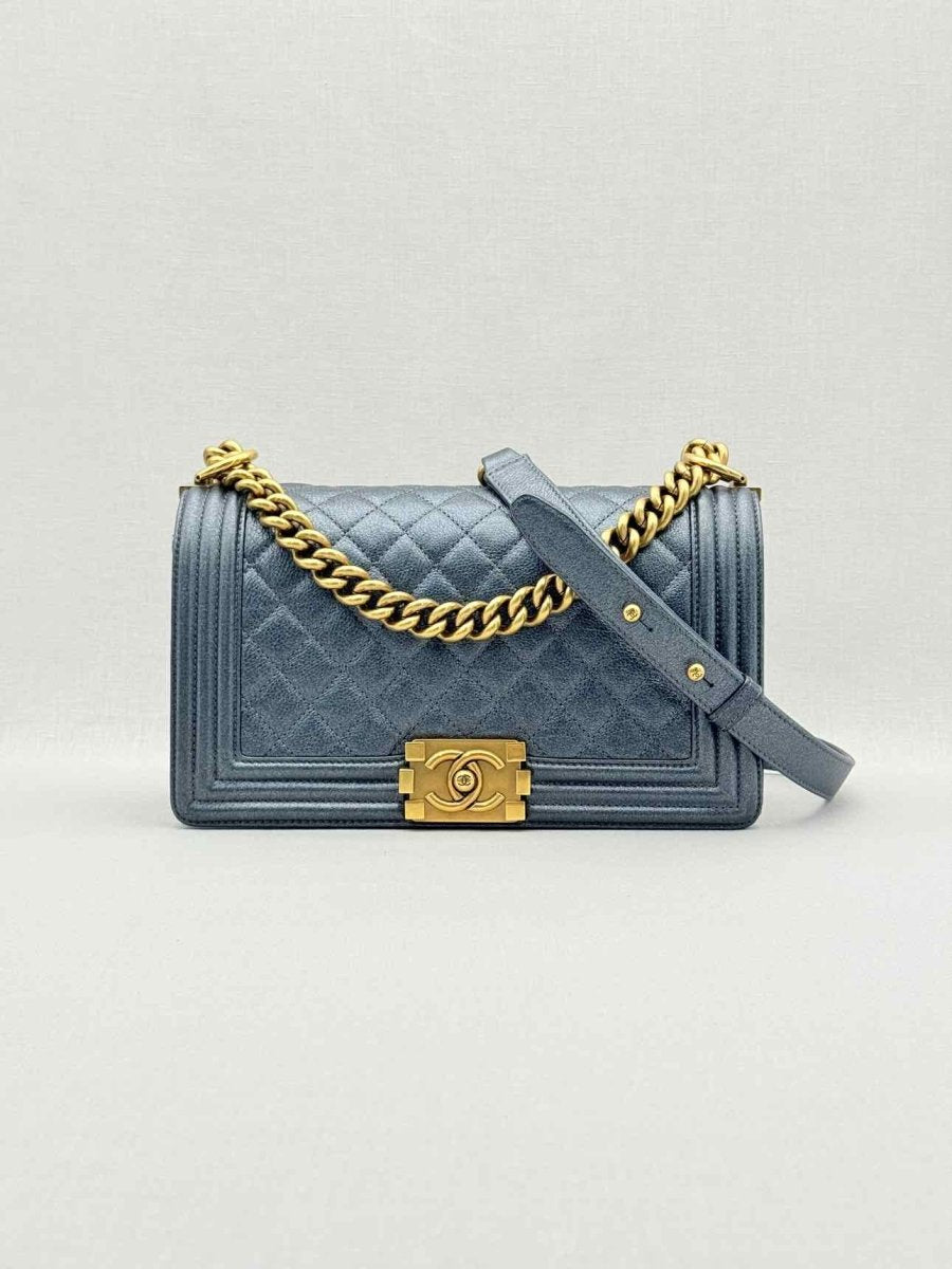 Pre - loved CHANEL Boy Metallic Blue Quilted Shoulder Bag at Reems Closet