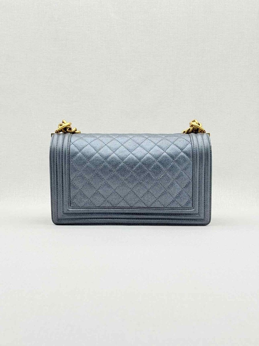 Pre - loved CHANEL Boy Metallic Blue Quilted Shoulder Bag at Reems Closet