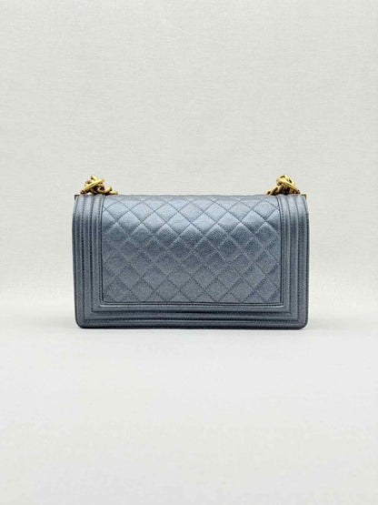 Pre - loved CHANEL Boy Metallic Blue Quilted Shoulder Bag at Reems Closet