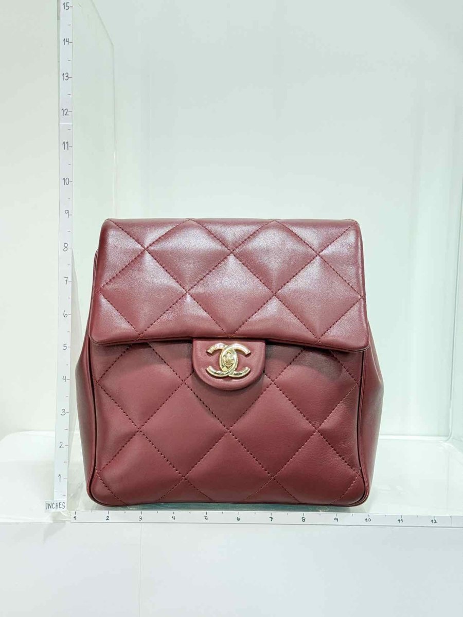 Pre - loved CHANEL Burgundy Quilted Backpack at Reems Closet