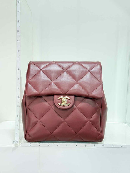 Pre - loved CHANEL Burgundy Quilted Backpack at Reems Closet