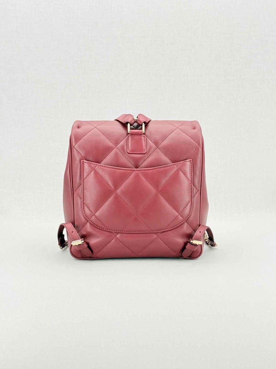 Pre - loved CHANEL Burgundy Quilted Backpack at Reems Closet