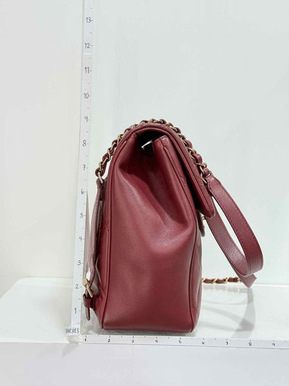 Pre - loved CHANEL Burgundy Quilted Backpack at Reems Closet
