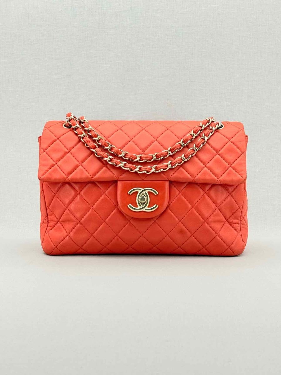 Pre - loved CHANEL Business Orange Quilted Shoulder Bag at Reems Closet