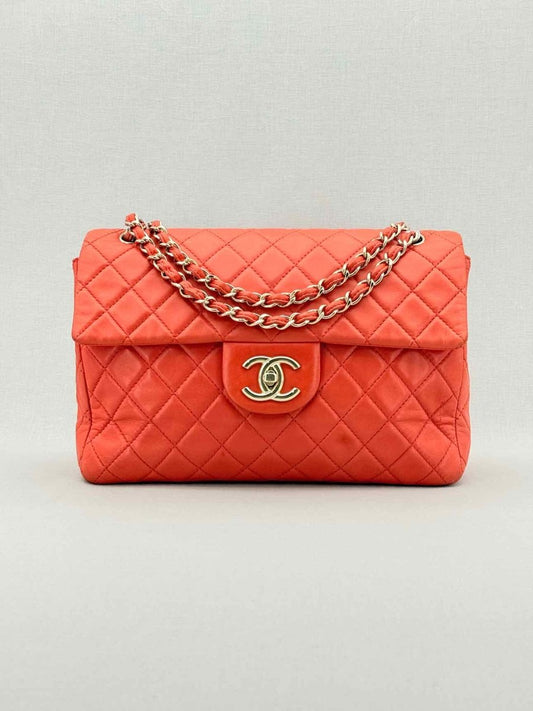 Pre - loved CHANEL Business Orange Quilted Shoulder Bag at Reems Closet