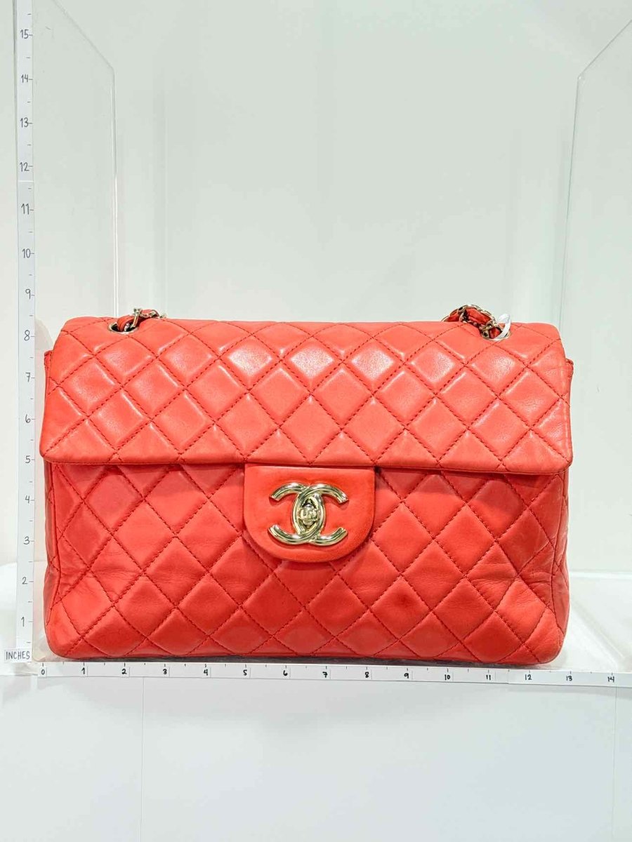 Pre - loved CHANEL Business Orange Quilted Shoulder Bag at Reems Closet