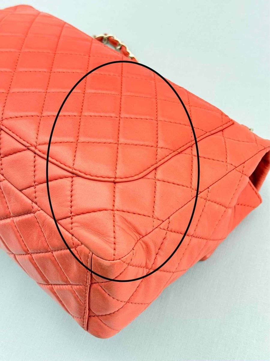 Pre - loved CHANEL Business Orange Quilted Shoulder Bag at Reems Closet
