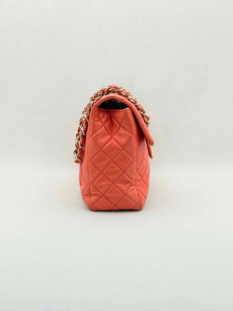 Pre - loved CHANEL Business Orange Quilted Shoulder Bag at Reems Closet