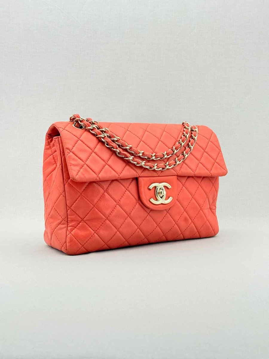 Pre - loved CHANEL Business Orange Quilted Shoulder Bag at Reems Closet