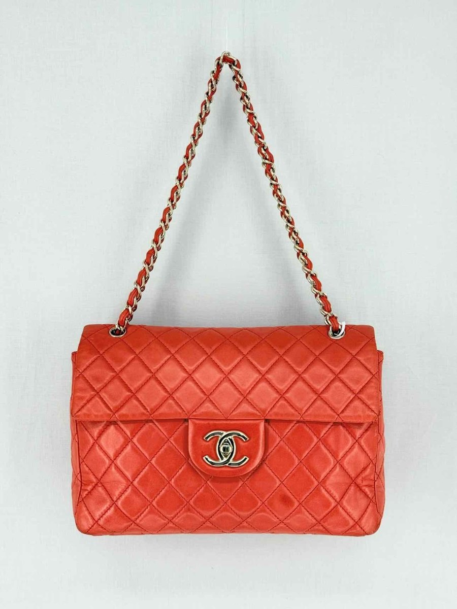 Pre - loved CHANEL Business Orange Quilted Shoulder Bag at Reems Closet