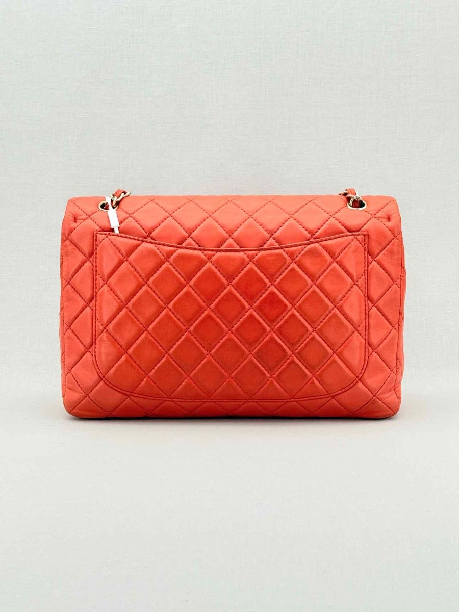 Pre - loved CHANEL Business Orange Quilted Shoulder Bag at Reems Closet