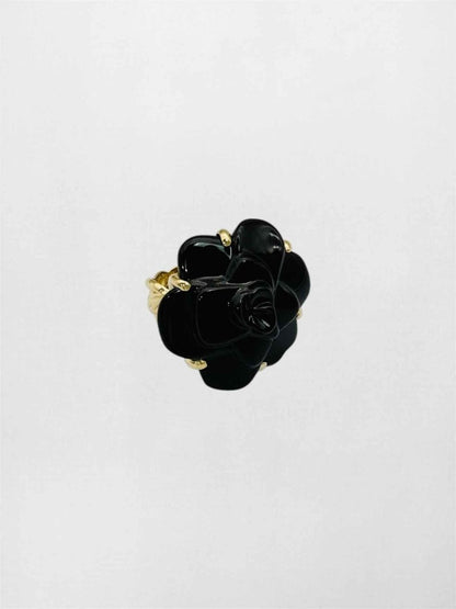 Pre-loved CHANEL Camelia black onyx Ring at Reems Closet