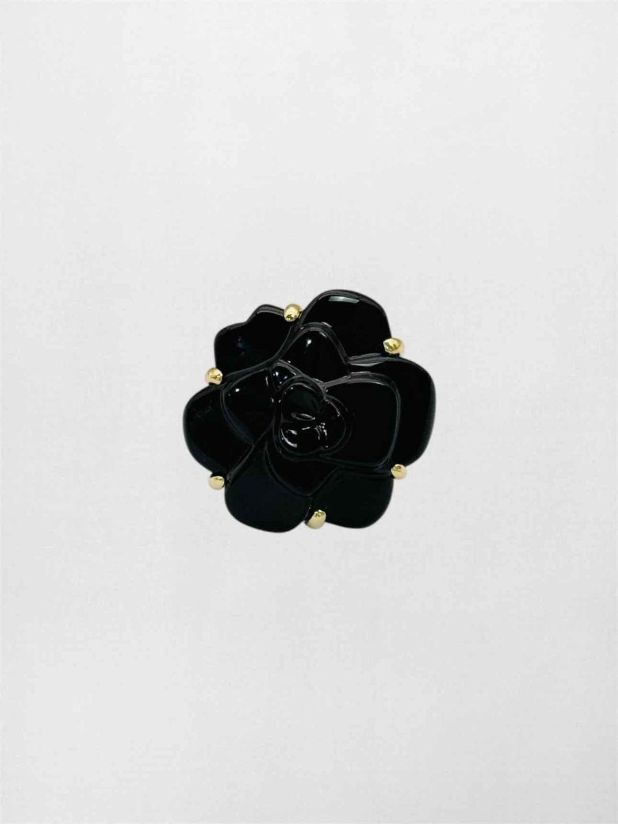 Pre-loved CHANEL Camelia black onyx Ring at Reems Closet