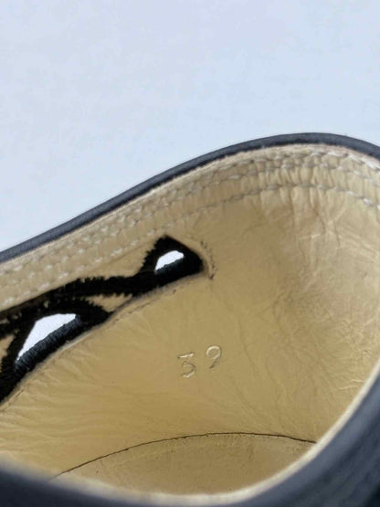 Pre - loved CHANEL Camellia Black Size EU 39 Sneakers at Reems Closet