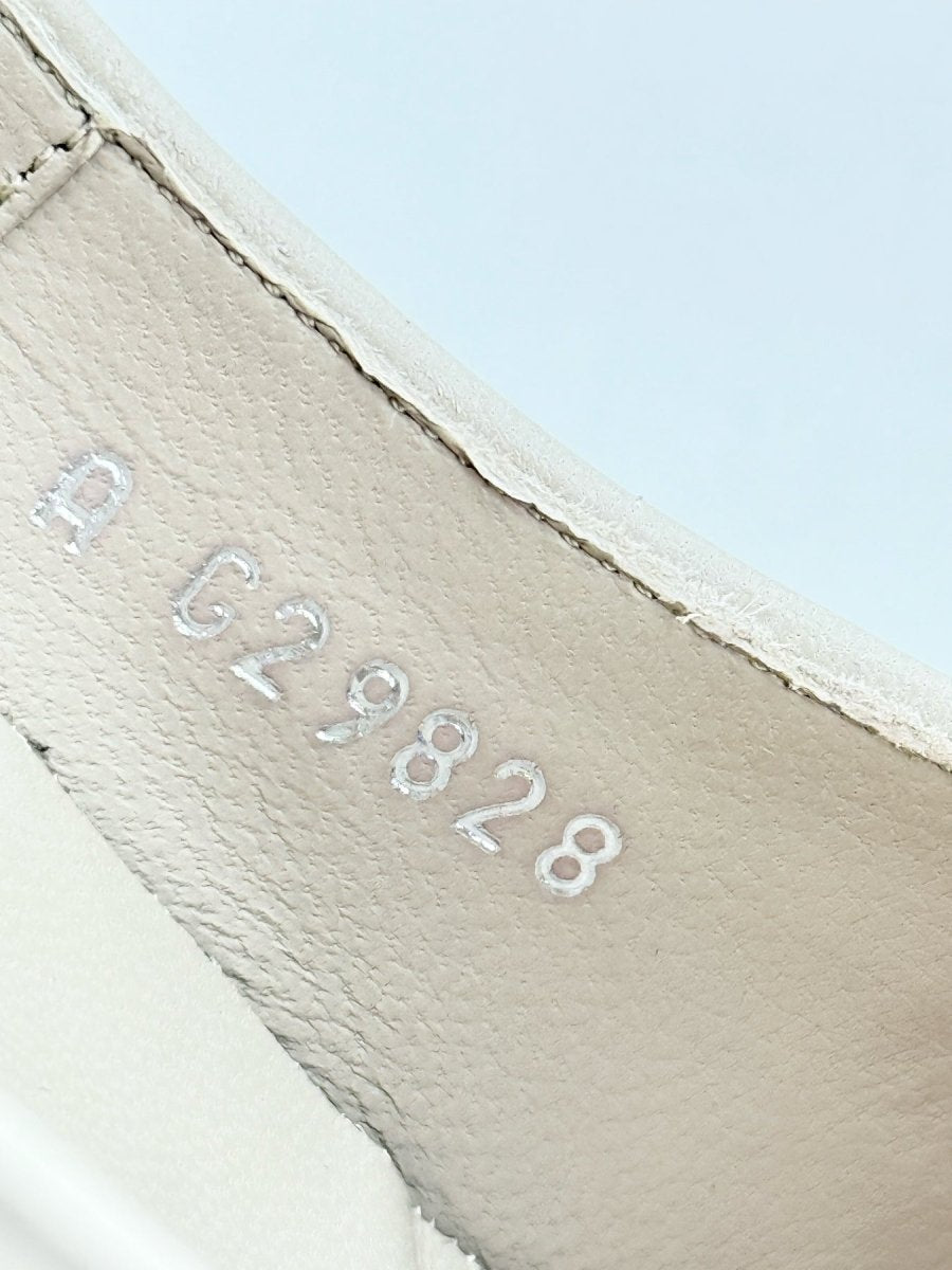 Pre - loved CHANEL CC Charms Off - white w/ Black Size EU 39 Pumps at Reems Closet