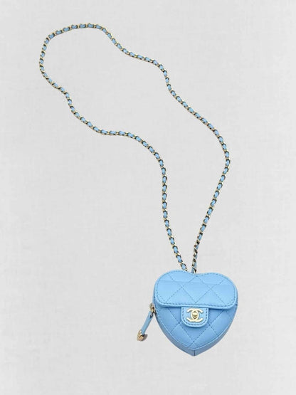 Pre-loved CHANEL CC in Love Heart Baby Blue Quilted Crossbody at Reems Closet