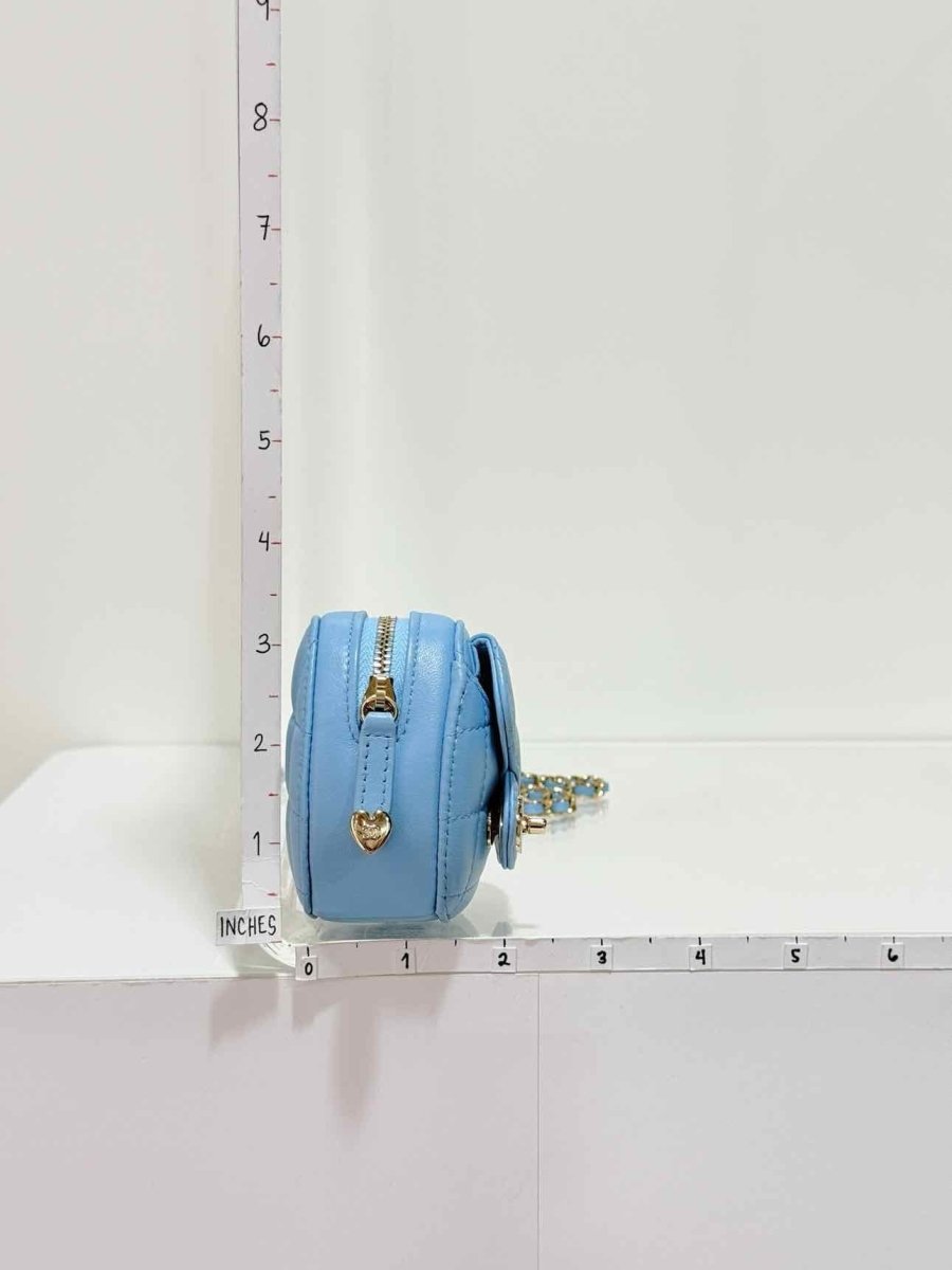 Pre-loved CHANEL CC in Love Heart Baby Blue Quilted Crossbody at Reems Closet