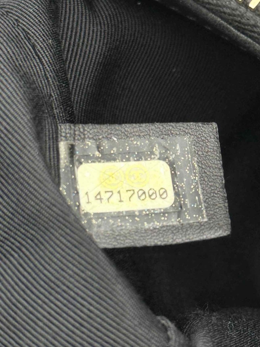 Pre - loved CHANEL Chain Me Black Quilted Tote Bag at Reems Closet