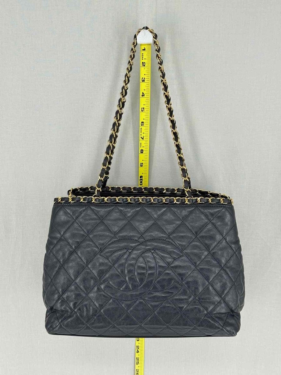Pre - loved CHANEL Chain Me Black Quilted Tote Bag at Reems Closet
