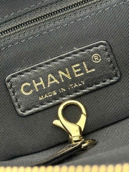 Pre - loved CHANEL Chain Me Black Quilted Tote Bag at Reems Closet