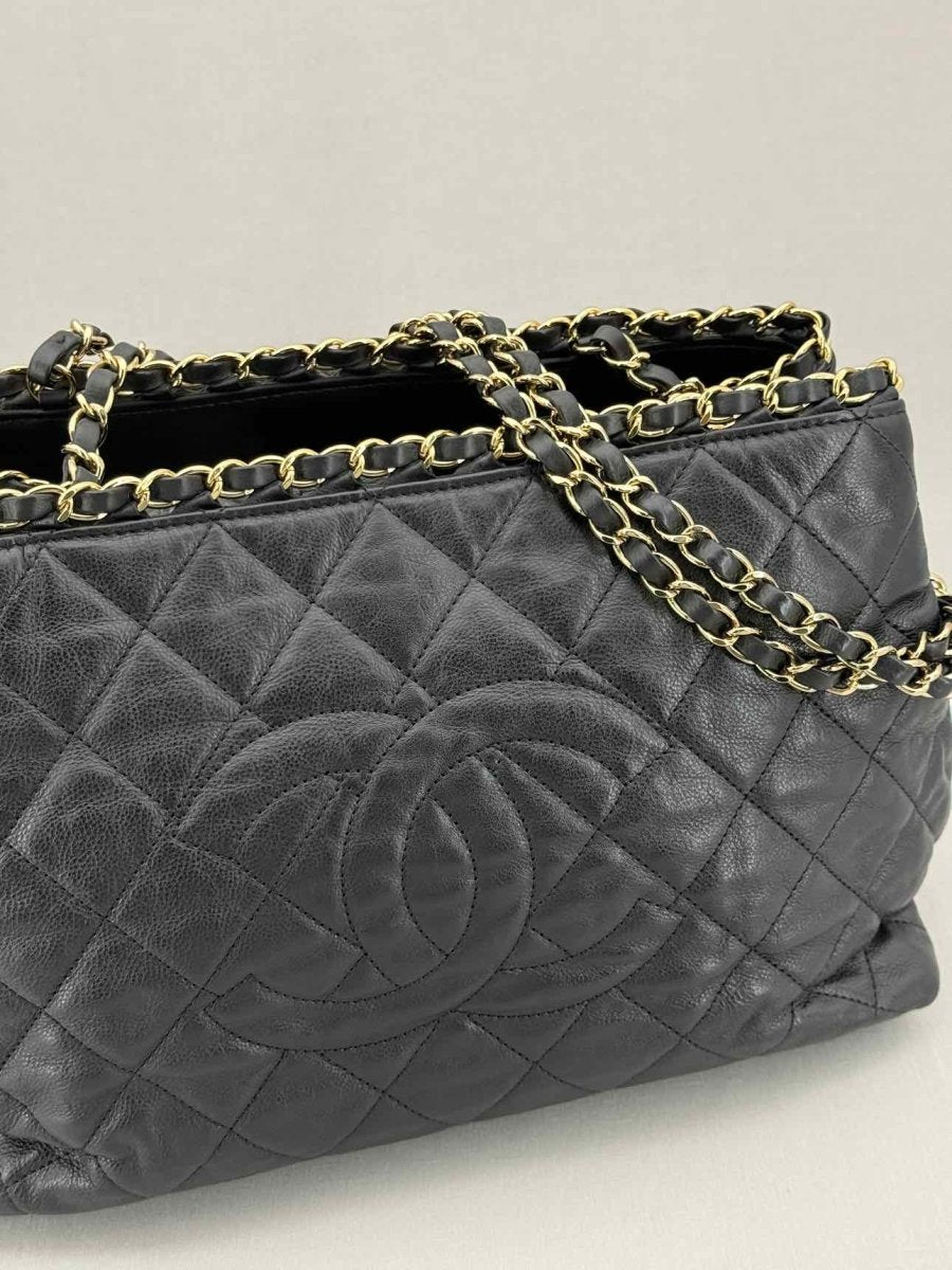 Pre - loved CHANEL Chain Me Black Quilted Tote Bag at Reems Closet
